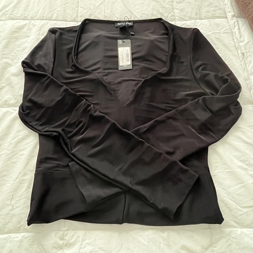 Black V-neck bodysuit by pretty little thing